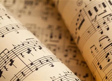 A close-up of sheet music on cream-colored paper. The notes are clear and easy to read.