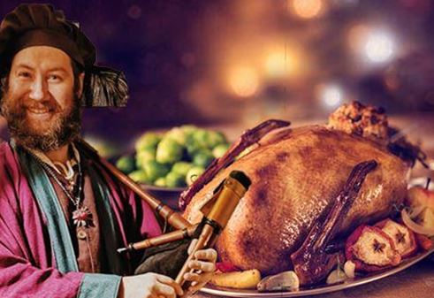 Un homme joyeux en vêtements traditionnels joue d'un instrument de musique. Sur la table se trouve un rôti magnifiquement présenté avec des légumes.