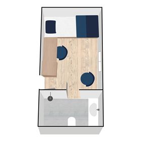 A clear room layout with a bed, a table, and chairs. The floor is light and made of wood.