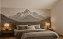 Une chambre moderne avec un lit confortable et des tables de nuit élégantes. Le mur est décoré d'un impressionnant motif de montagne.